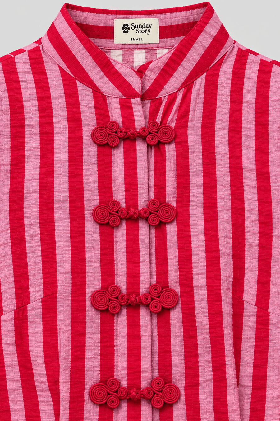 AMMY PINK STRIPED SCALLOPED PEPLUM TOP WITH FROG BUTTONS - Sunday Story