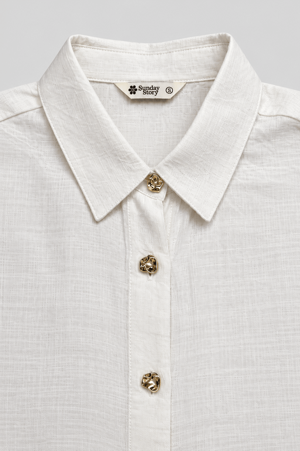 DEMI ASYMMETRICAL GATHERED SHIRT WITH STATEMENT BUTTONS - Sunday Story