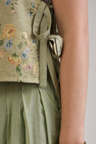 ELENOR SAGE GREEN FLORAL BROCADE SIDE-TIE BIB - Sunday Story